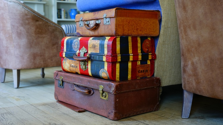Stacked suitcases_Mike Birdy_Stocksnap
